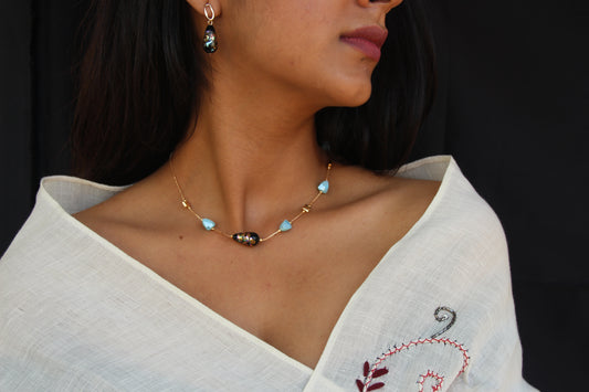 Almond Shaped Light Blue Crystals and Black Japanese Beads