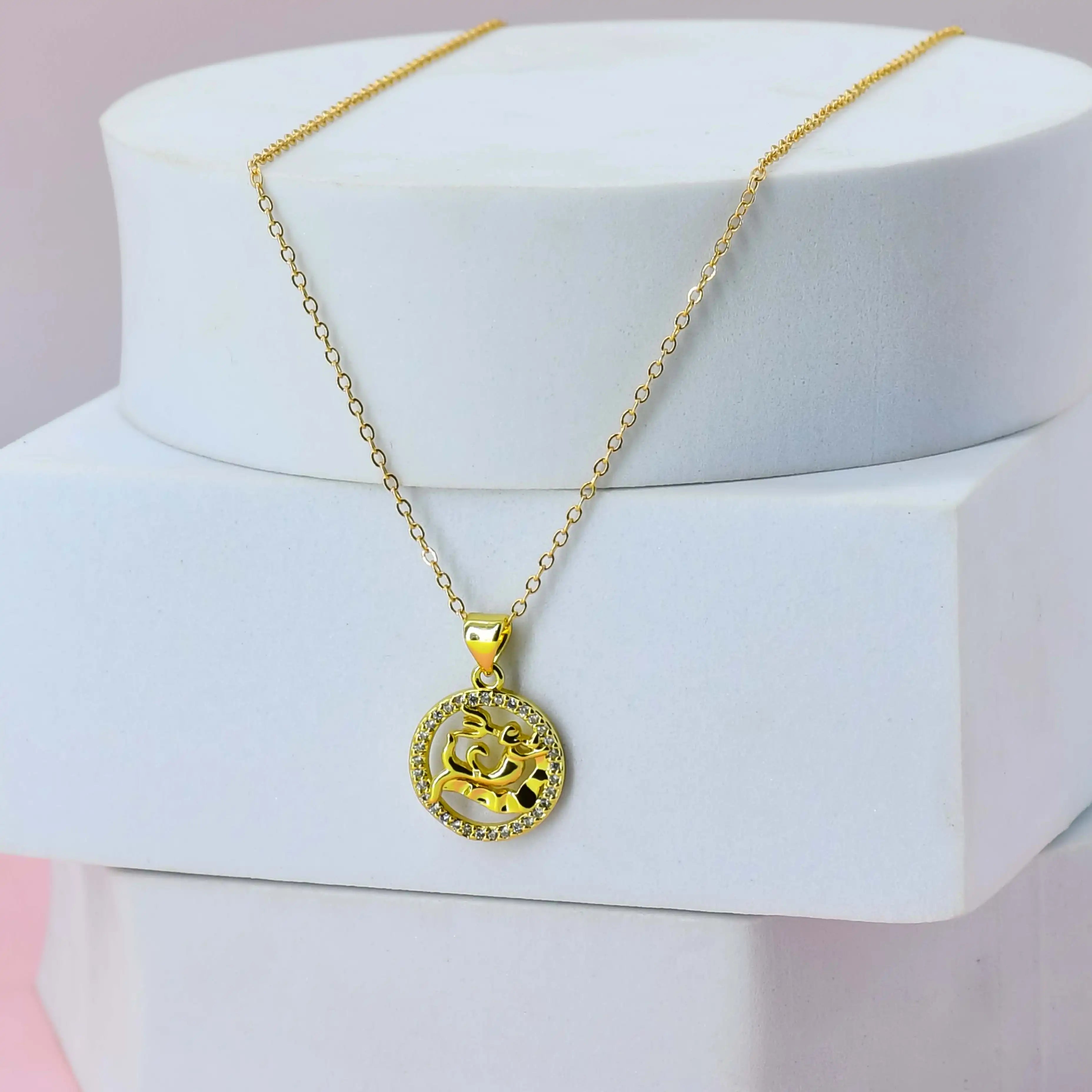 Gold Plated Chain with a Aquarius pendant on a white stand