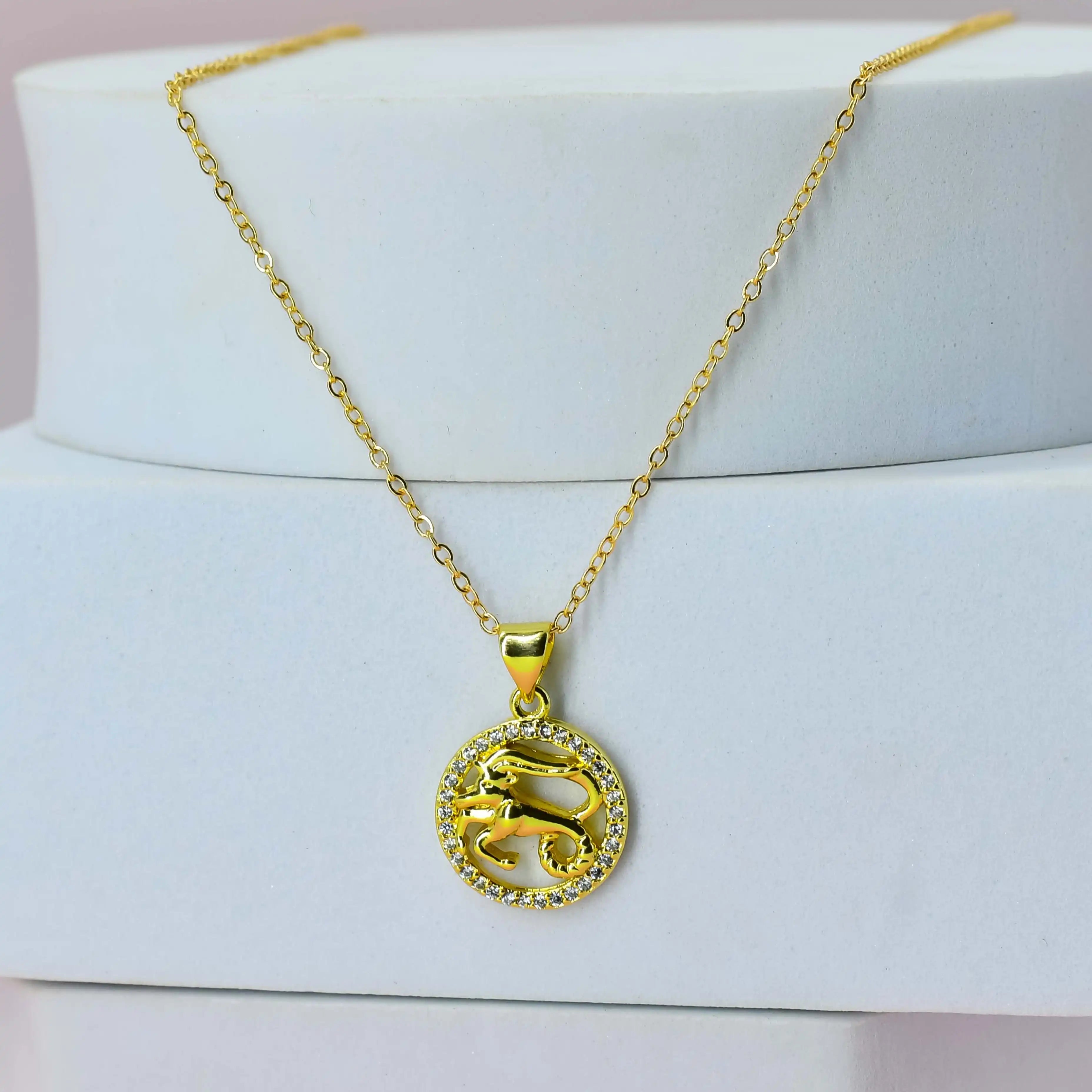 Gold Plated Chain with a Aries pendant on a white stand