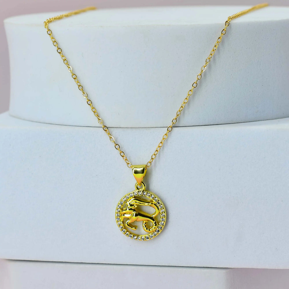 Gold Plated Chain with a Aries pendant on a white stand
