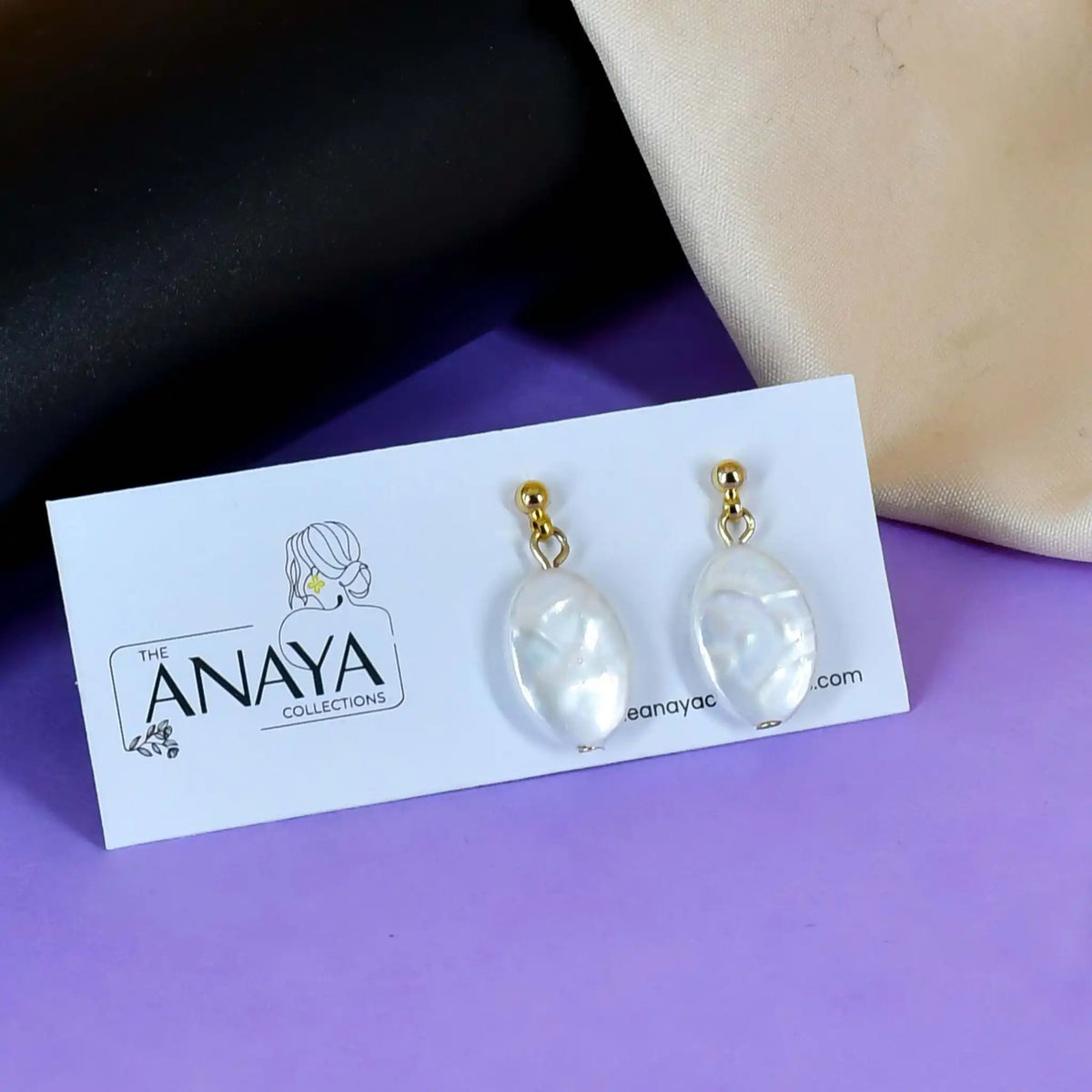 Uncut Oval Drop Earrings